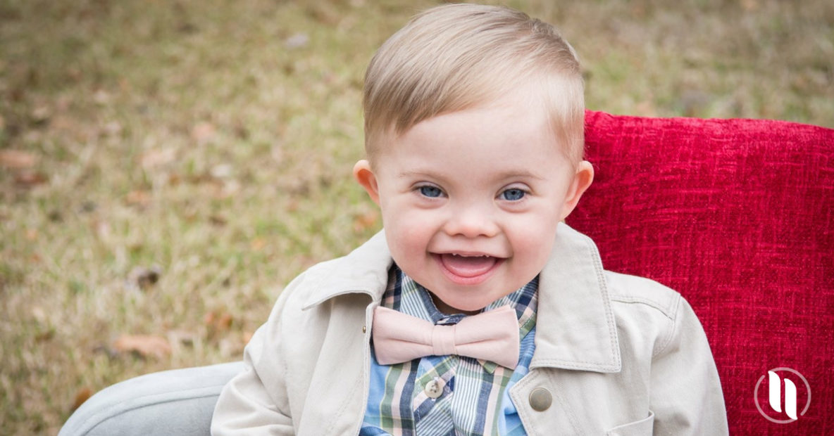 boy with down syndrome wearing bow tie